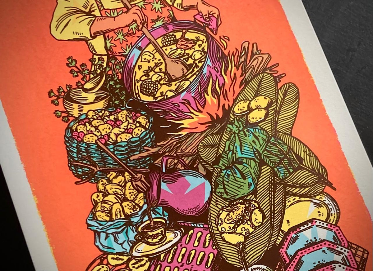 Detail of colorful illustration of a person cooking over a fire with various food items and utensils on an orange background at Ocio Gallery in Bogota, Colombia